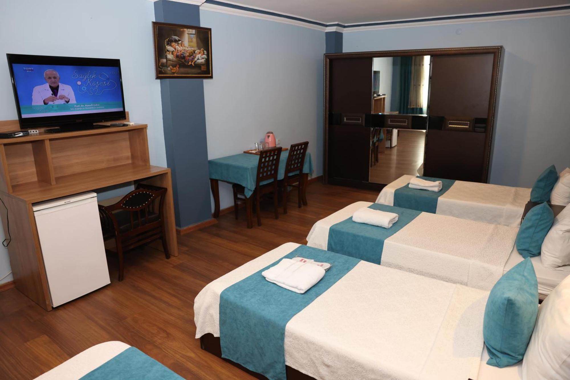 Adana Saray Hotel Bagian luar foto